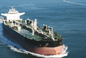 Tanker sailing in a body of water.